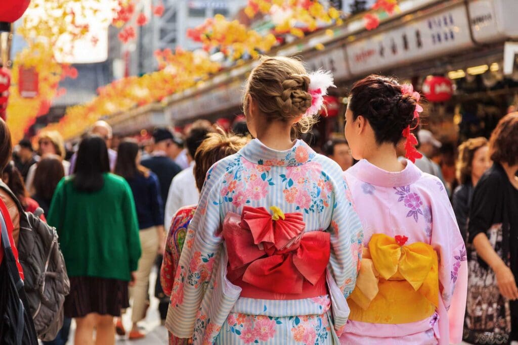 A group of people walking down the street.