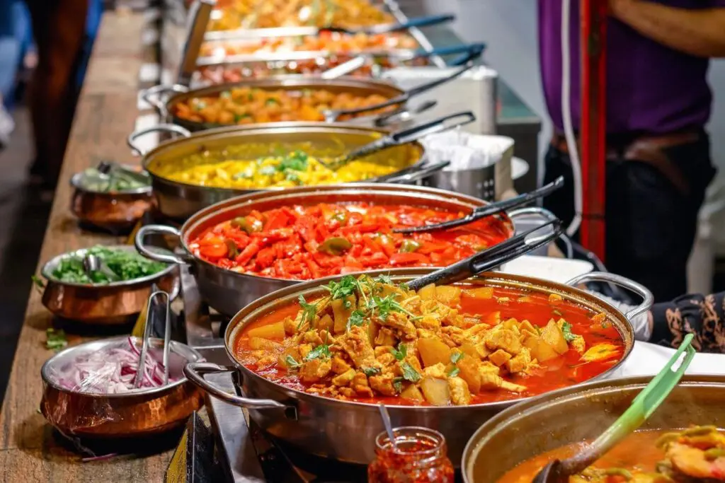 A buffet of various types of food on display.