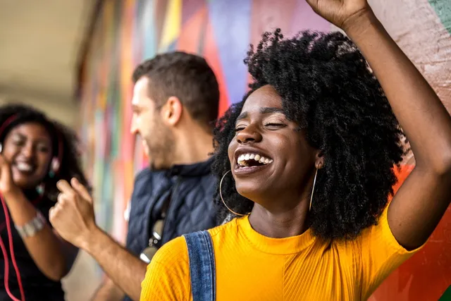 A woman with her hands in the air